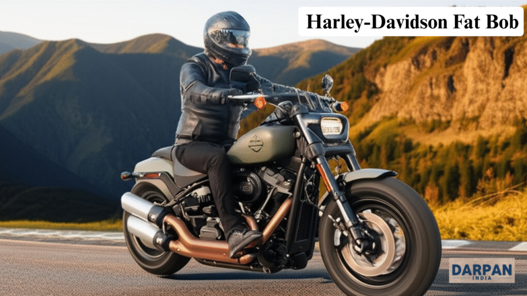 harley-davidson fat bob motorcycle with a rider speeds on a road
