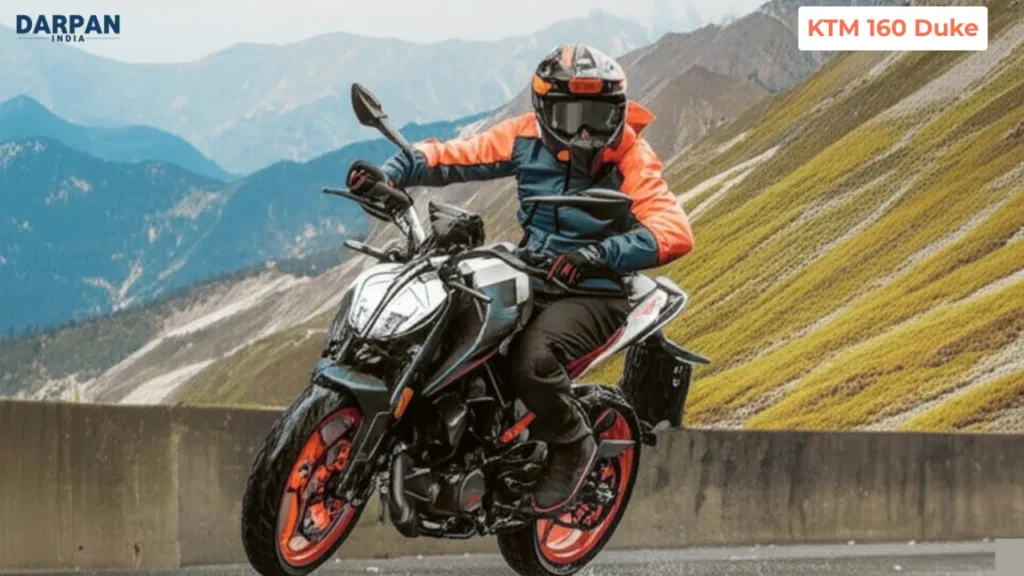 ktm 160 duke performing a wheelie on a mountain road